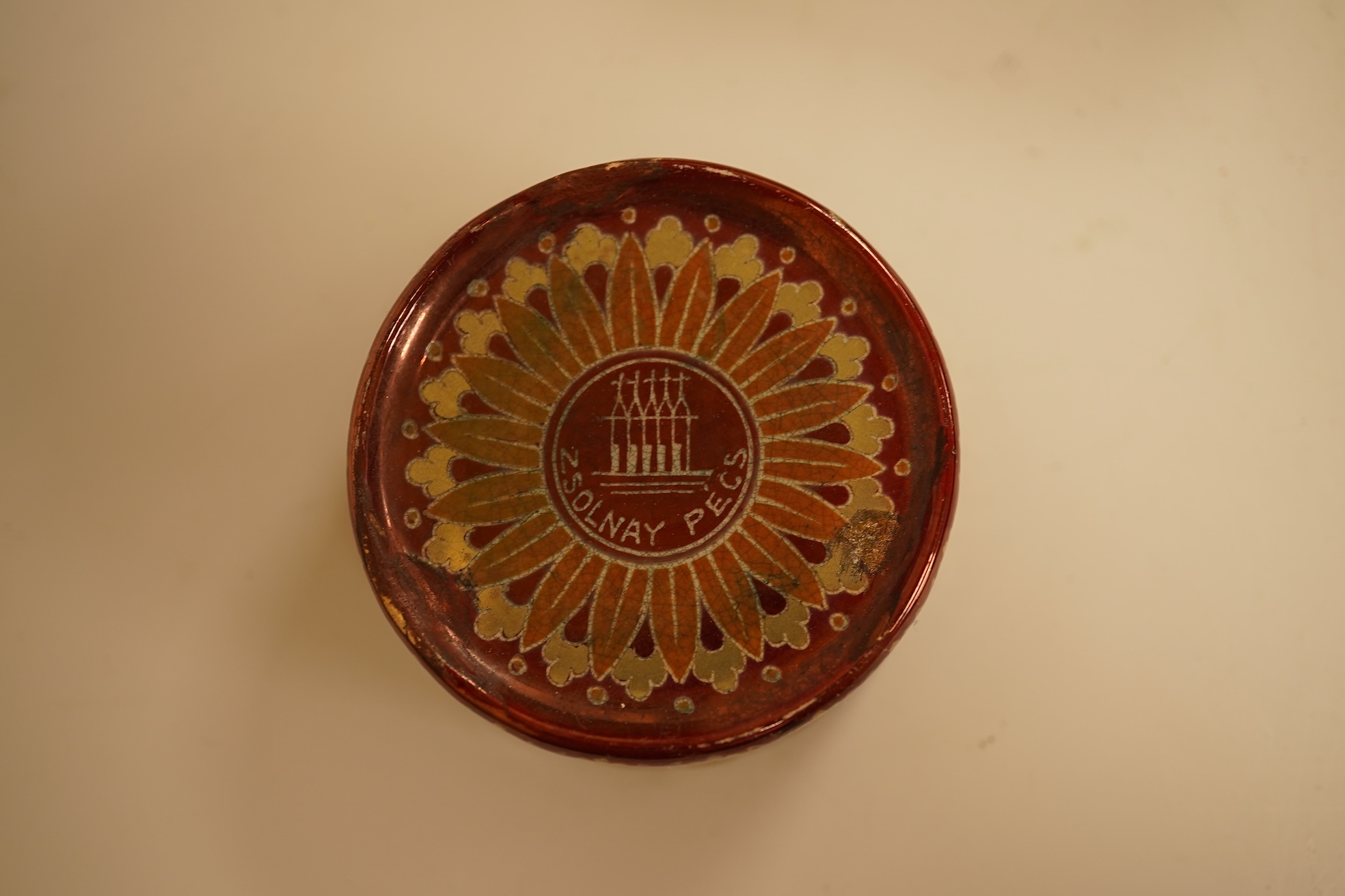 A Zsolnay lustre 'chicken' box and cover and two Sevres style porcelain boxes and covers (3) ‘chicken box’ 5cm diameter.